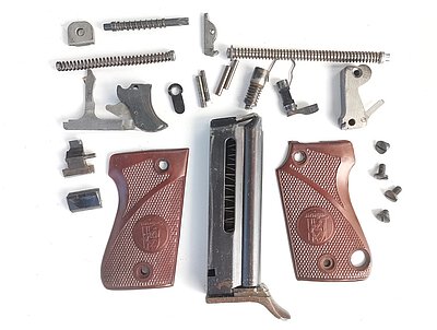 Unique Mod. "L", Kal. .22lr. Ersatzteilset, Magazin, Schlagbolzen, etc.
